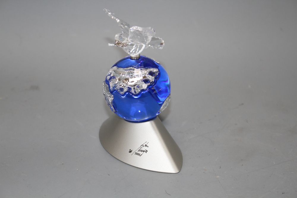 A Swarovski Crystal ornament Planet Vision 2000, in original box with certificate, overall height 12cm